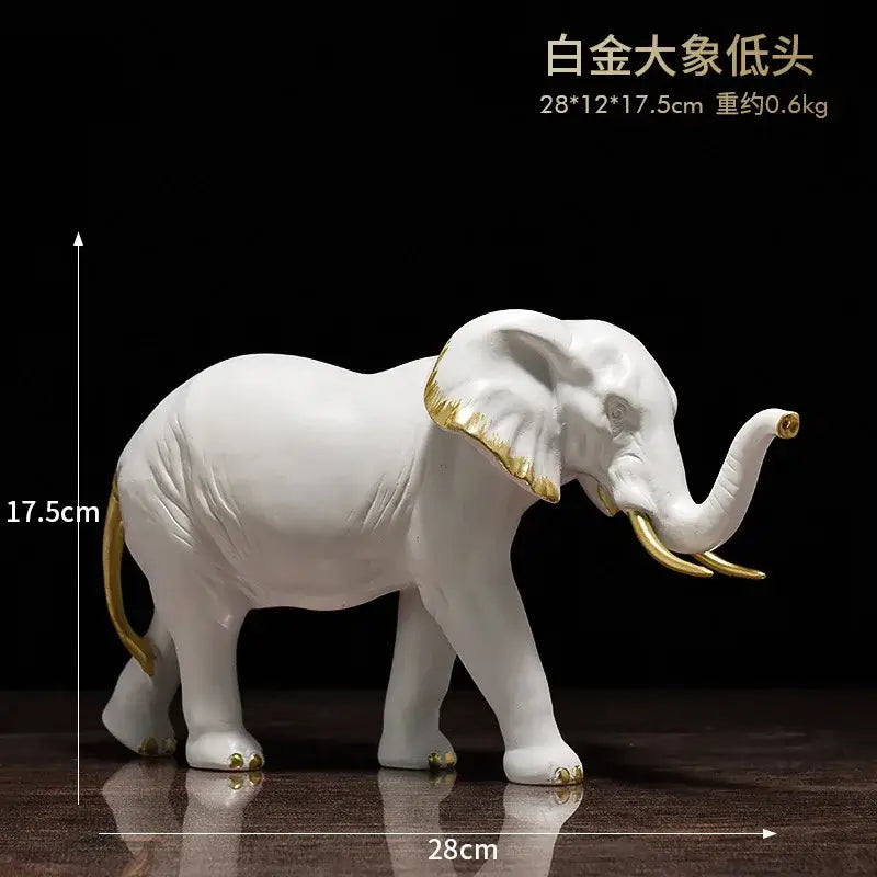 White and gold elephant resin sculpture ornaments with ceramic finish for living room decor by decorbites elephant resin