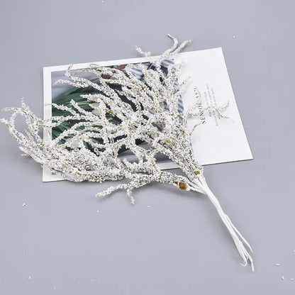A delicate white frosted decorbites artificial branches arrangement with tiny bead accents for branches home decor