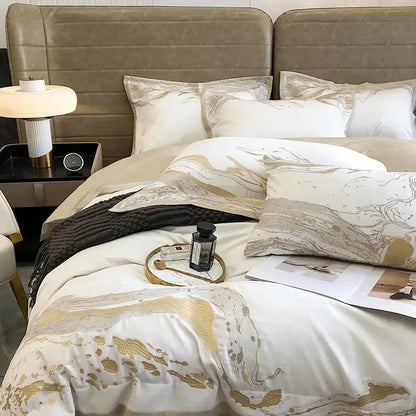 White and gold marble egyptian cotton luxury bedding set with a satin finish for an elegant bedroom look