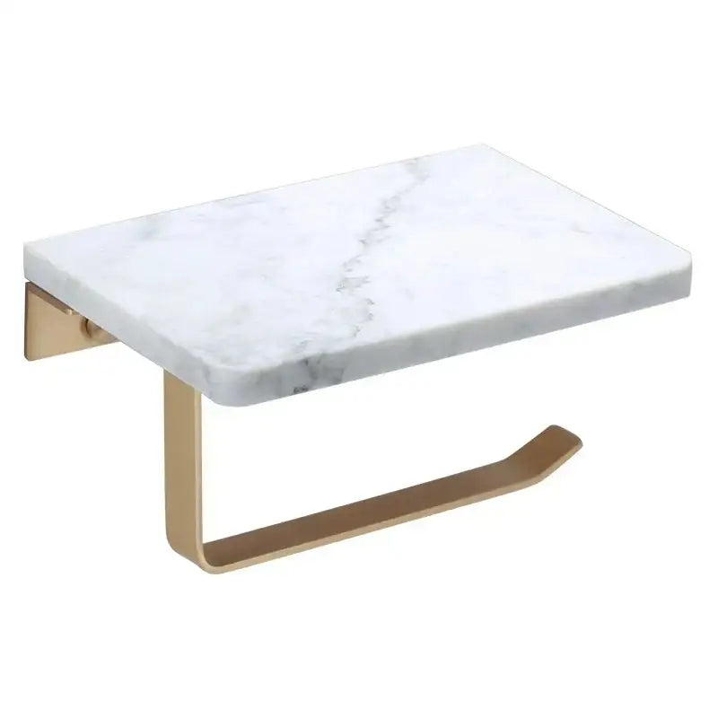 White and gold marble toilet paper holder with sleek gold-toned metal base and curved support arm by decorbites gold marble