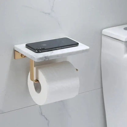 White and gold marble paper holder with built-in shelf holding smartphone decorbites gold marble bathroom shelf