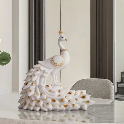 White and gold peacock sculpture with detailed feather design for home decor by decorbites golden phoenix peacock