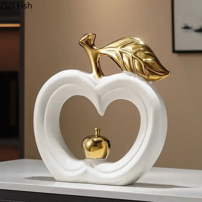 White and gold pear ceramic desk ornament features a white ceramic apple with gold leaf and a miniature gold pear decorbites gold pear