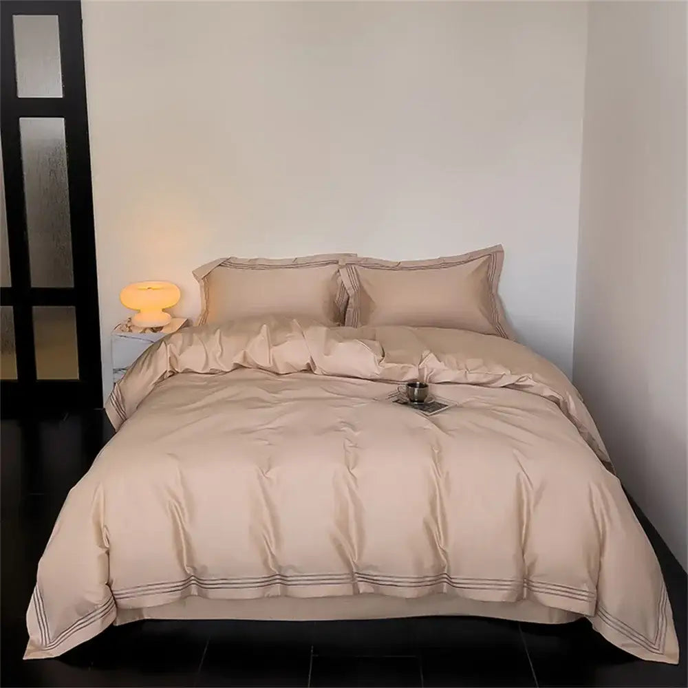 Beige satin duvet set with subtle striped trim in decorbites 1200tc embroidered egyptian cotton bedding set