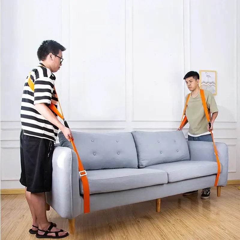 Gray upholstered sofa with wooden legs secured by white and orange decorbites furniture lifting straps for moving use