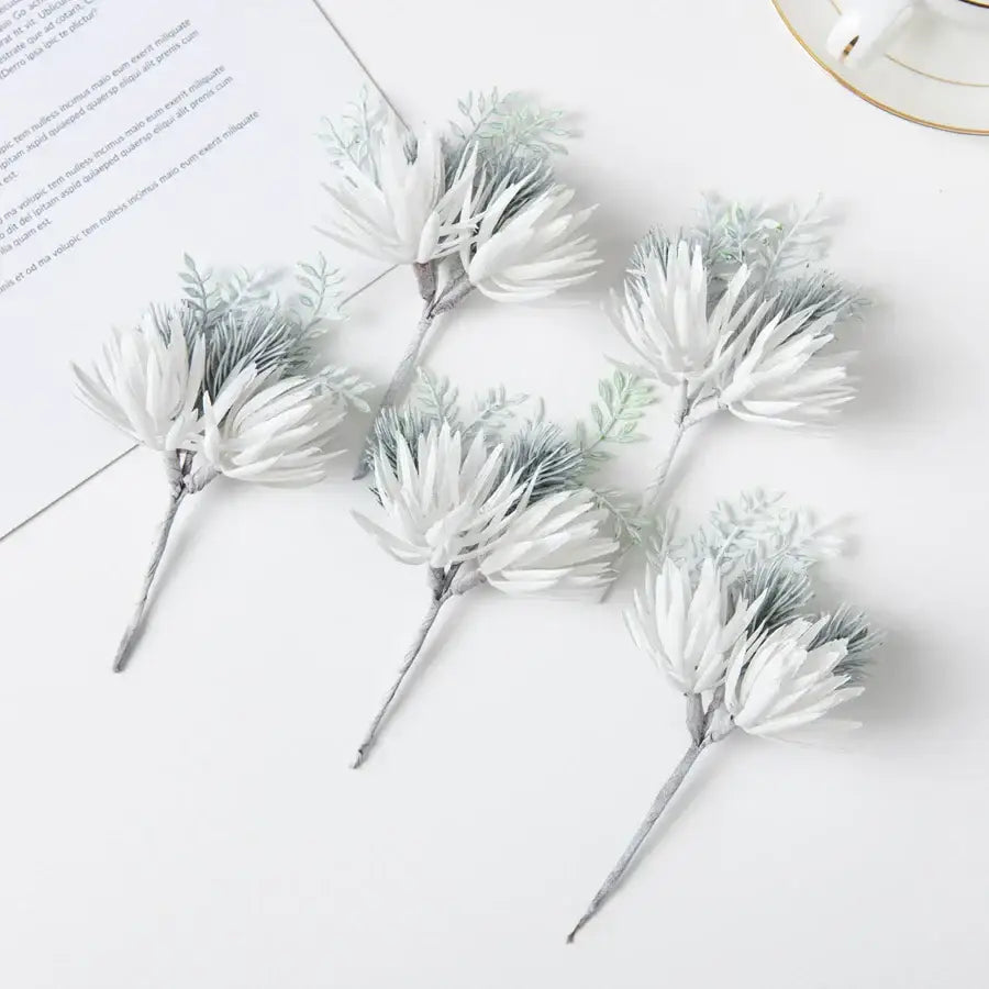 White and silver artificial flowers garland with white and light green artificial flowers sprigs for wedding decor by decorbites artificial flowers