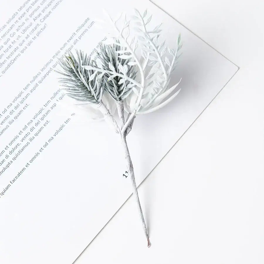 White and silver artificial flowers garland with delicate white frosted needles and slender leaves for decorbites artificial flowers decor