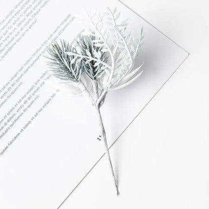 White and silver artificial flowers garland with delicate white frosted needles and slender leaves for decorbites artificial flowers decor