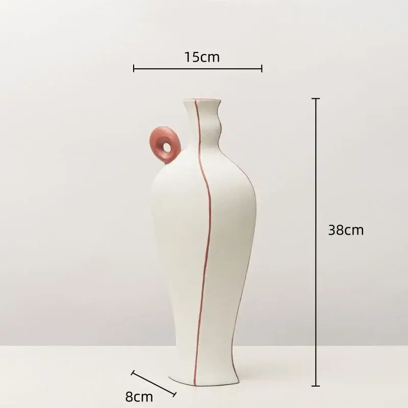 White ceramic vase with pink handle and matching stripe featuring geometric black lines for living room decor