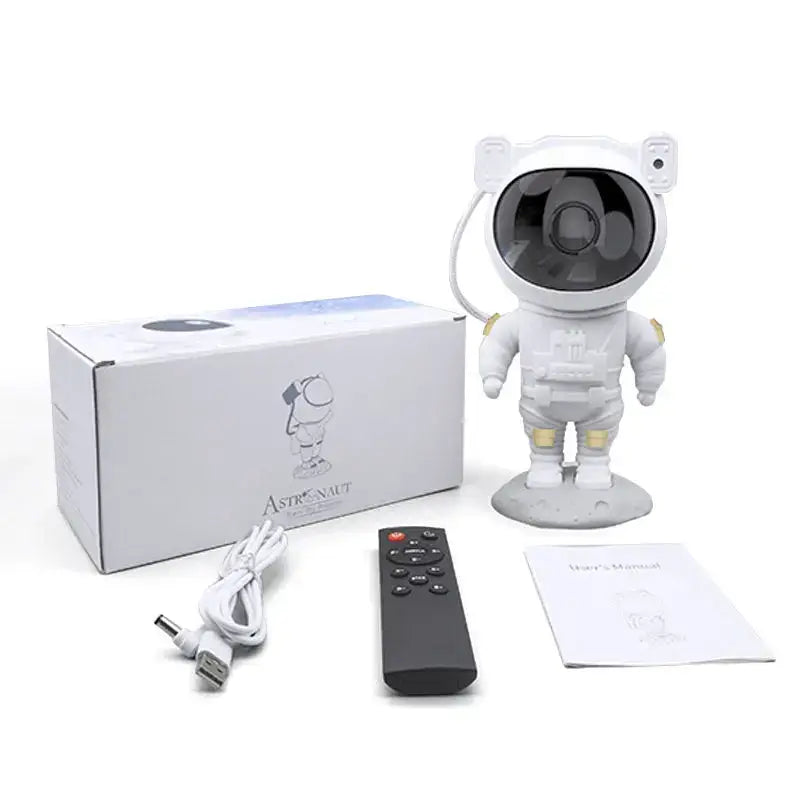 White astronaut star night light projector with black lens and gold accents for bedroom decorbites astronaut star use