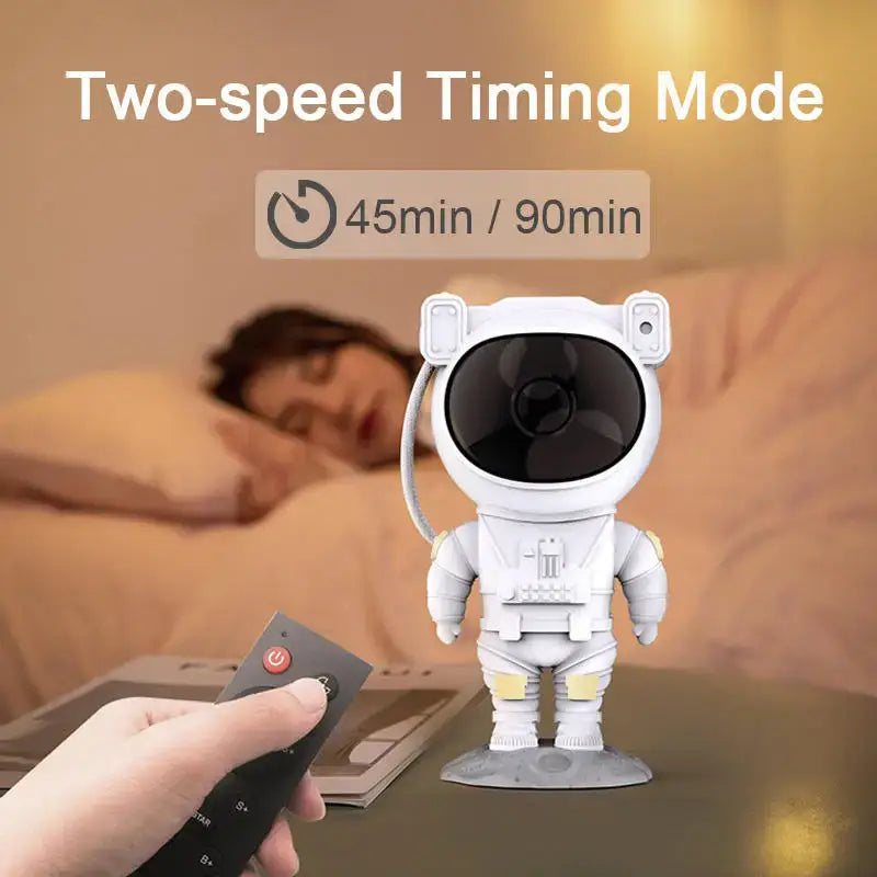 White astronaut star night light projector with black lens and yellow joints for bedroom moon base decorbites astronaut star