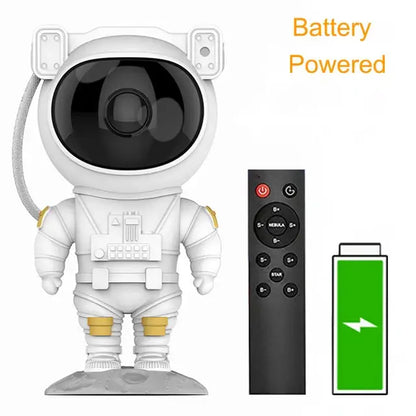 White astronaut star projector lamp with black lens and gold accents projecting starry night skies for bedroom decor