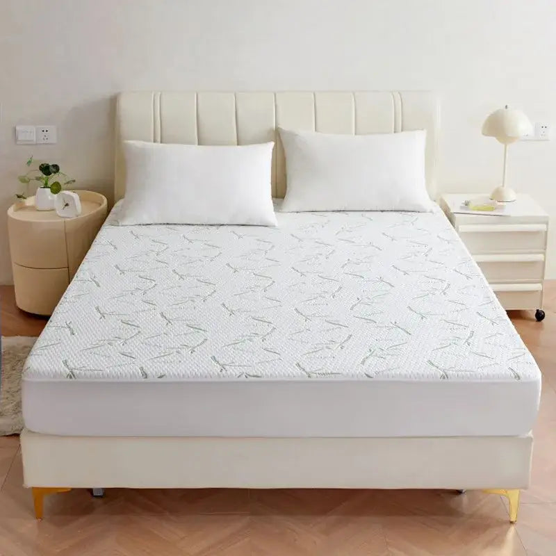 White bamboo jacquard waterproof fitted mattress cover with subtle gray leaf pattern and textured surface decorbites jacquard waterproof