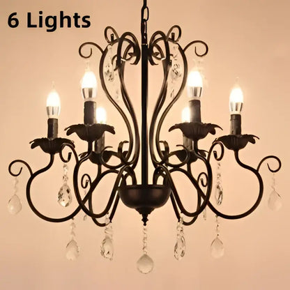 Black white metal chandelier with six lit bulbs and crystal pendants for dining room decorbites black white style