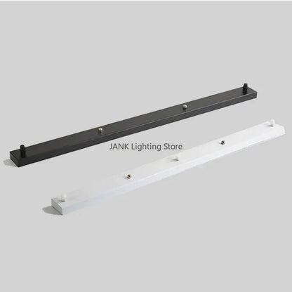 Black and white metal pendant light ceiling mount canopy brackets with hooks and evenly spaced screw fasteners back side