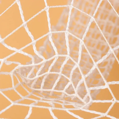 White butcher’s string roll meat mesh netting featuring a woven textured design for kitchen display purposes