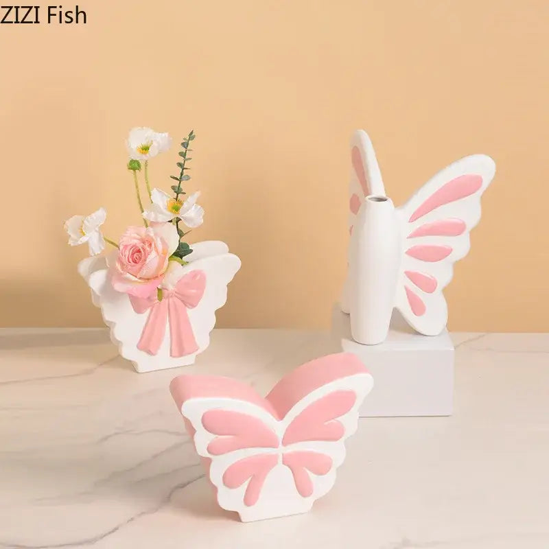 White and pink butterfly ceramic vase with floral arrangement and pink bow decorbites butterfly ceramic living room decor