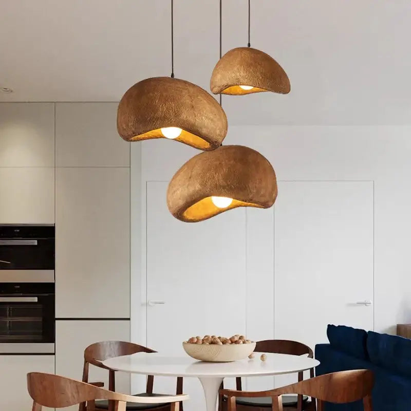 White cement wind cloud pendant light trio with rustic earth-toned textured shells for living room decorbites cement wind decor