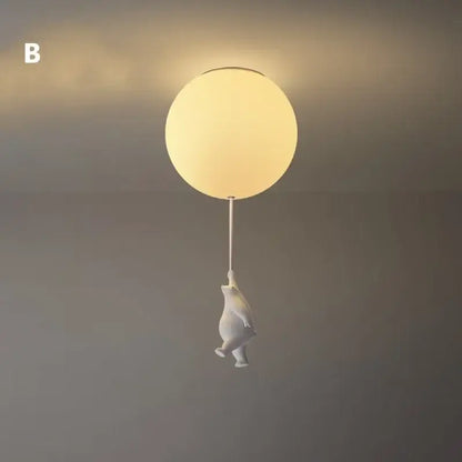 White ceramic bear led ceiling chandelier with glowing glass globe light fixture for bedroom illumination