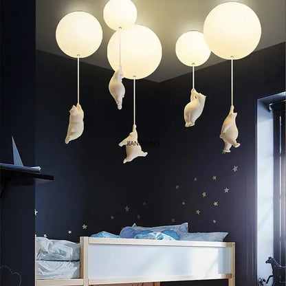 White ceramic bear led ceiling chandelier featuring frosted glass globes for bedroom lighting in a modern design
