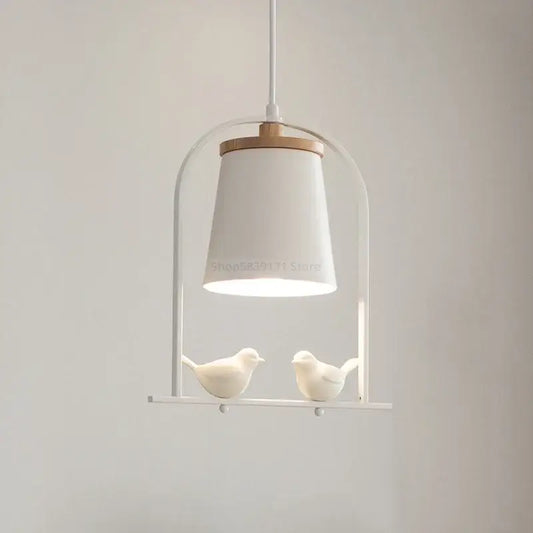 White ceramic bird led pendant light with wooden accent and arched metal frame for dining room decorbites bird led decor