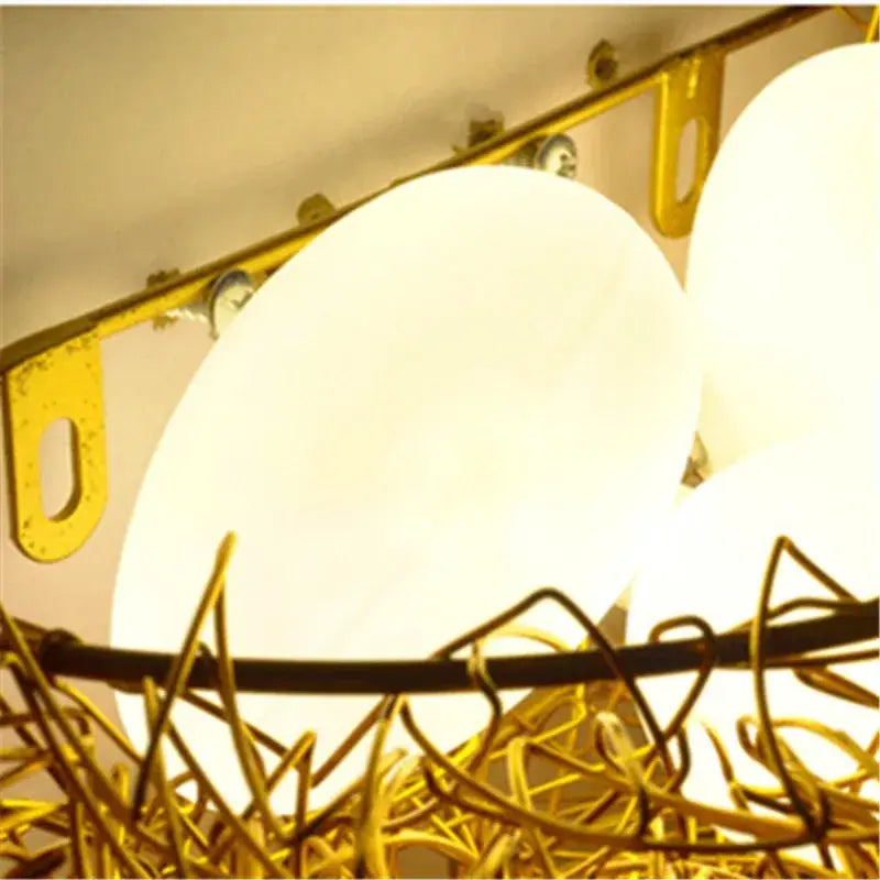 Gold-toned wire bird nest led wall lamp with frosted white glass shades for decorbites bird nest bedroom decor