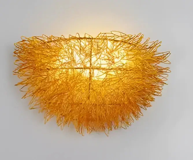 Golden intricately woven wire wall lamp with warm glow for decorbites bird nest led bedroom decor