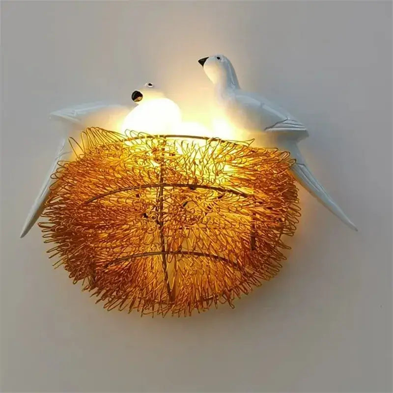 White ceramic bird wall lamp with glowing golden wire nest decorbites bird nest led for bedroom decor