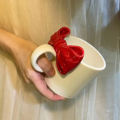 White ceramic bow knot mug featuring a glossy red bow knot ceramic design for dining room decorbites style porcelain cup
