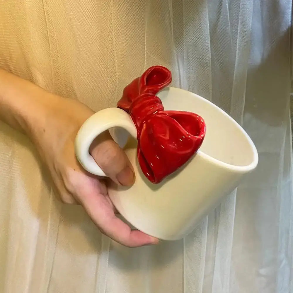 White ceramic bow knot mug with a glossy red decorbites bow knot for dining room porcelain cup use