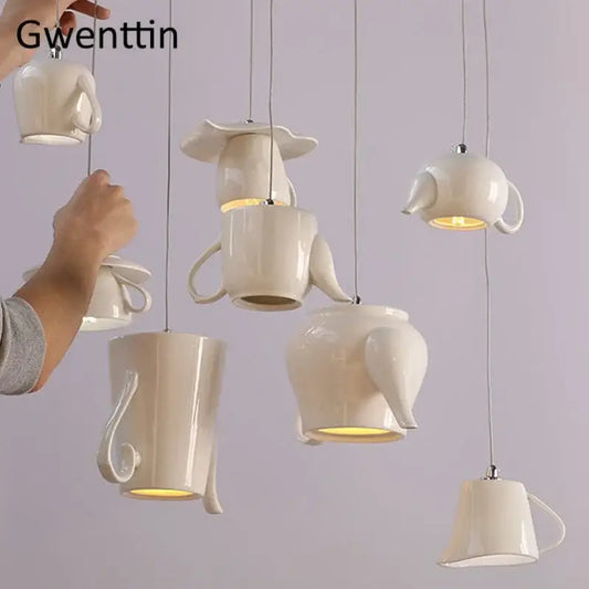 White ceramic teapot led pendant lights with warm glowing interiors by decorbites ceramic led pendant for kitchen decor