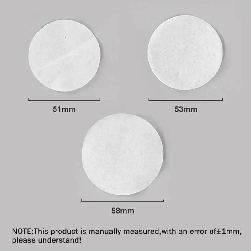 White circular disposable coffee filter papers in 51mm 53mm and 58mm sizes for decorbites coffee filter use