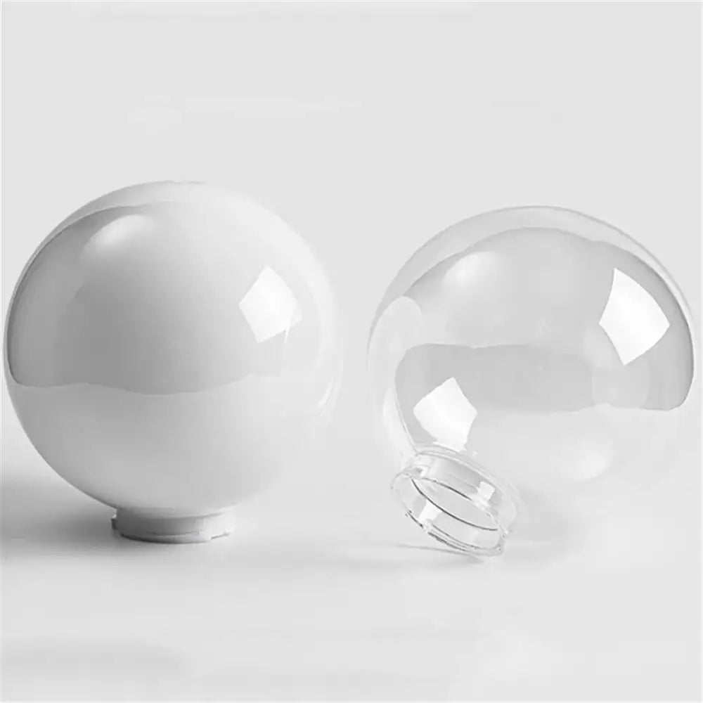 Two acrylic round globe lamps in white opaque and clear transparent for outdoor garden decorbites acrylic round lighting
