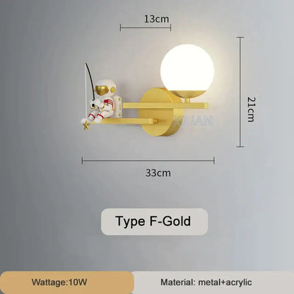 Gold-finished wall lamp with whimsical decorbites astronaut wall lamp holding fishing rod beside white acrylic globe light