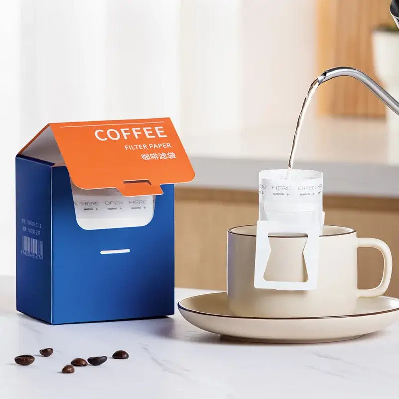 White disposable coffee filter bags in a pour-over setup featuring decorbites coffee filter for efficient brewing
