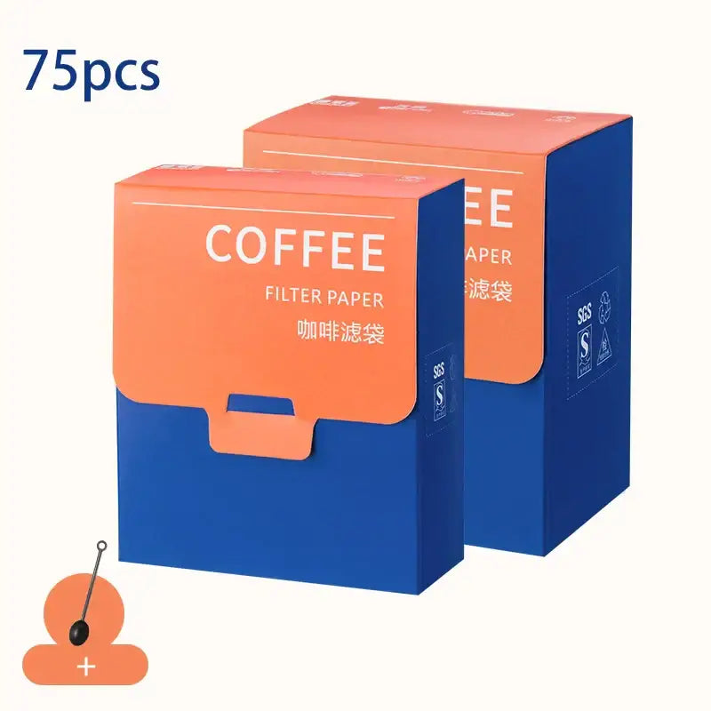 Two vibrant orange and blue decorbites coffee filter bags made of white disposable paper for kitchen pour over setup