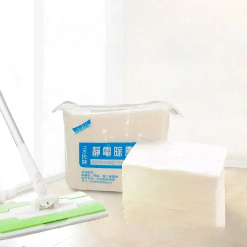 A stack of white absorbent microfiber decorbites kitchen cleaning cloths in clear packaging for kitchen cleaning