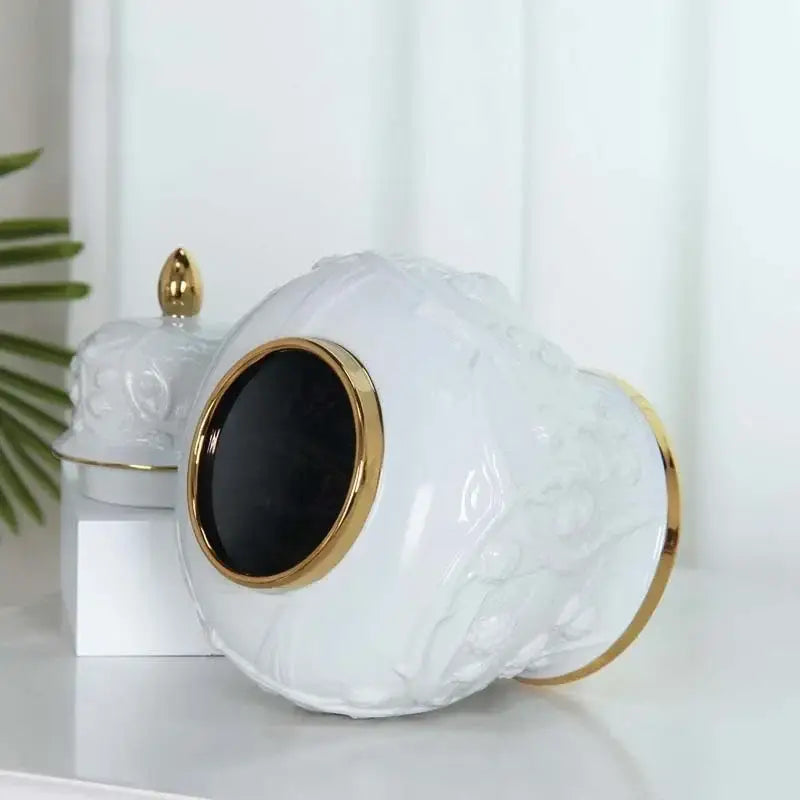 White embossed flower ceramic ginger jar vase with gold trim and floral relief for living room storage