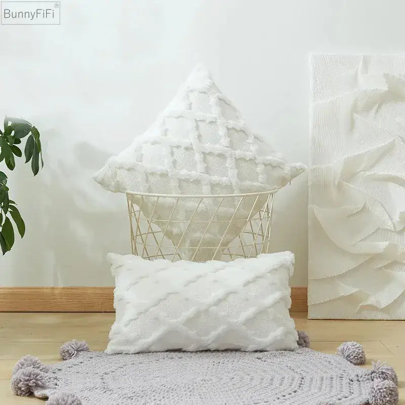 White embroidered diamond cushion cover with textured woven pattern in soft plush material for living room decor