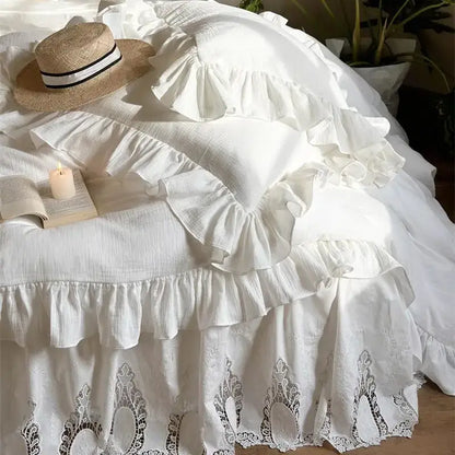 White embroidered lace cotton ruffles bedding set with ruffled bed skirt and delicate lace trim for bedroom luxury