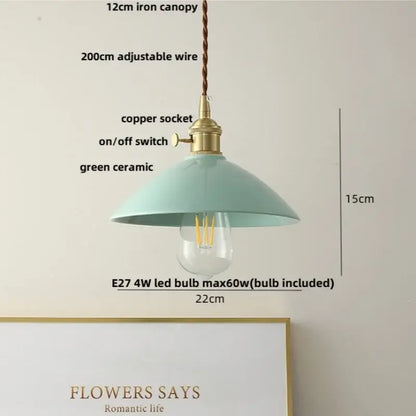 A mint green ceramic pendant light with brass copper socket and decorbites ceramic knob switch for kitchen lighting