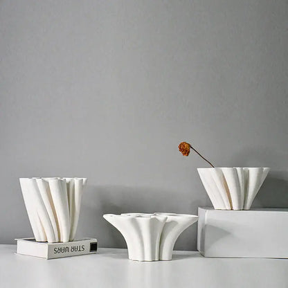 White geometric ceramic fold pattern vase with fluted petal design for living room decorbites geometric ceramic fold decor