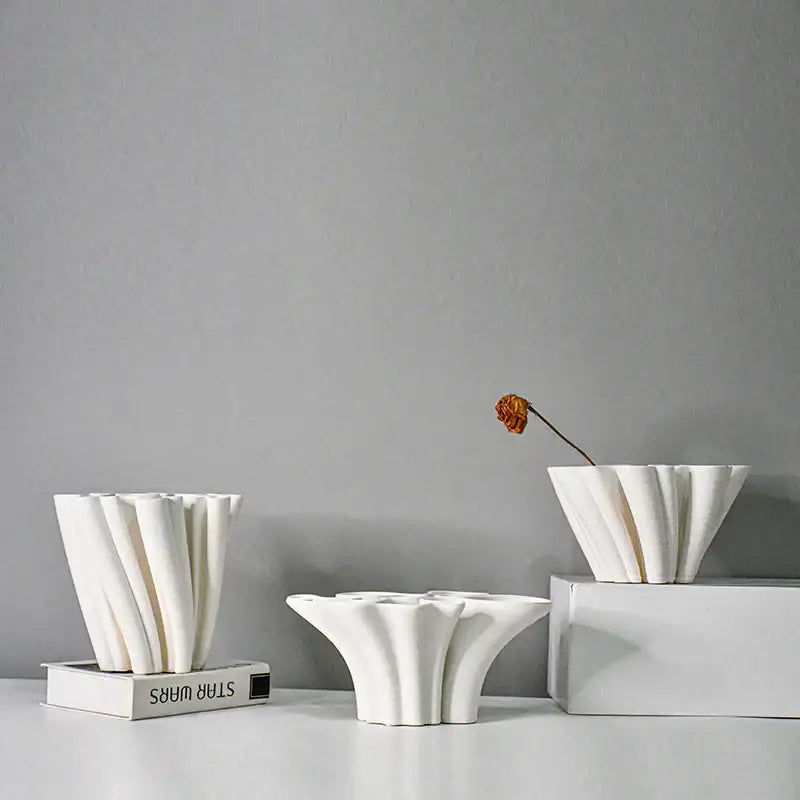 White geometric ceramic fold pattern vase with fluted petal design for living room decorbites geometric ceramic fold decor