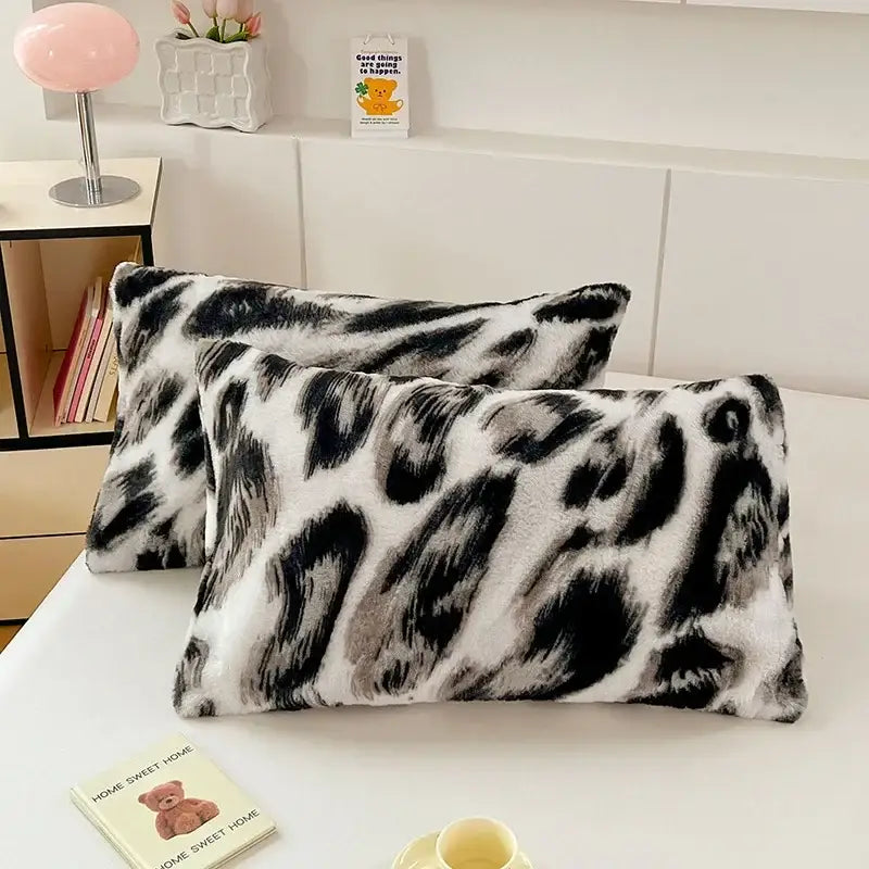 Fuzzy black and white leopard-print cozy winter plush pillowcase with soft texture for decorbites cozy winter decor