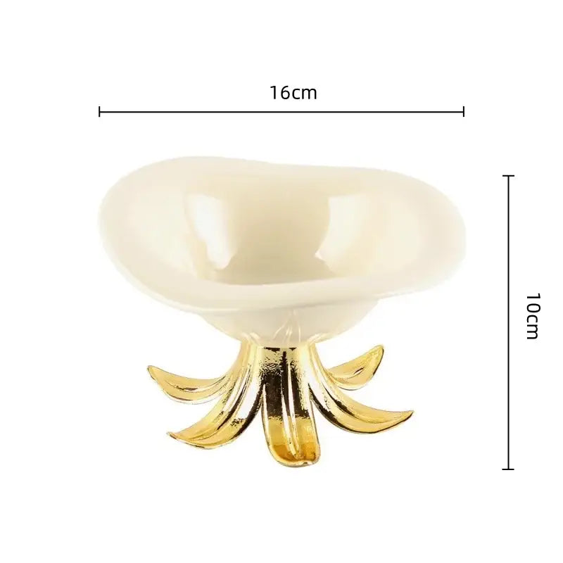 Cream-colored ceramic fruit plate with a gold-toned petal-like base tray bowl for dining room centerpiece