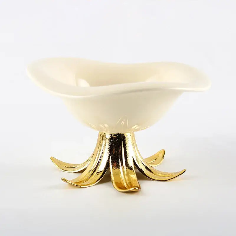 Cream-colored ceramic fruit plate with gold-toned leaf pedestal base for elegant dining room centerpiece tray bowl