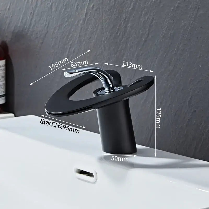 Black matte-finish basin faucet with chrome accents featuring a sleek modern design for decorbites golden white bathroom sinks
