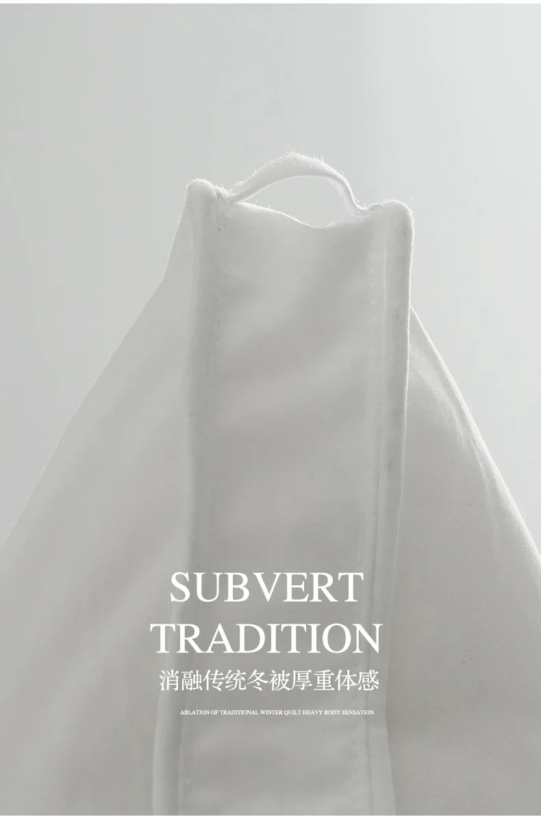 White goose down thick warm quilted winter blanket with plush texture and subtle sheen for autumn and winter use