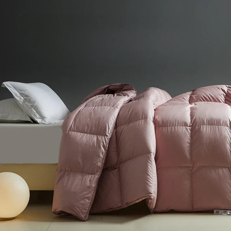 A plush dusty rose white goose down autumn winter duvet with stitched velvet quilt panels for single or double beds