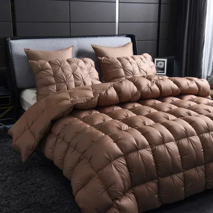 Warm brown quilted white goose down comforter set with tufted pillows for a warm winter double duvet